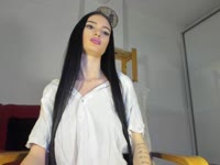 I look gentle enough to be underestimated. Long hair, soft features, a quiet presence. The tattoos aren’t decoration—they’re punctuation marks in a sentence people think they’ve already read.